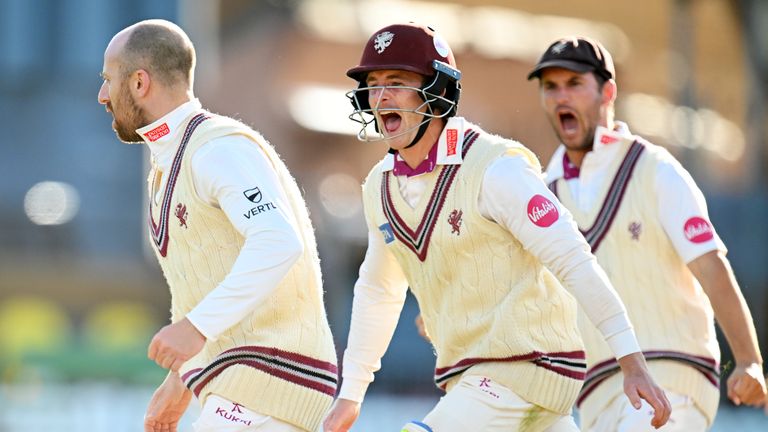 TAUNTON, ENGLAND - SEPTEMBER 12: Jack Leach of Somerset celebrates the wicket of Dan Worrall of Surrey with team mate Tom Abell and Lewis Gregory to win the match during Day Four of the Vitality County Championship Division One match between Somerset and Surrey at The Cooper Associates County Ground on September 12, 2024 in Taunton, England. (Photo by Harry Trump/Getty Images)
