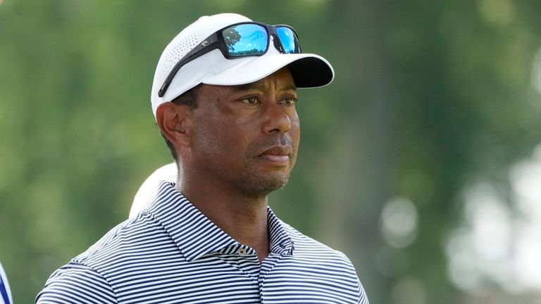 Tiger Woods watches his son Charlie Woods play during the first round of stroke play of the U.S. Junior Amateur Golf Championship earlier this year (AP Photo/Carlos Osorio)