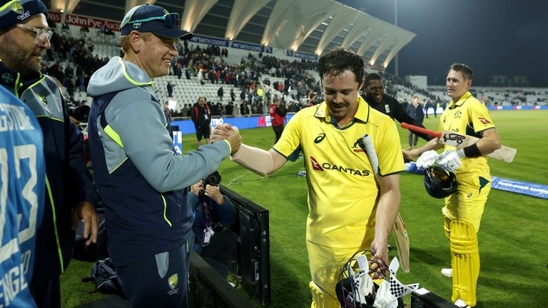 Travis Head is congratulated by coach Andrew McDonald following his match-winning innings for Australia against England at Trent Bridge