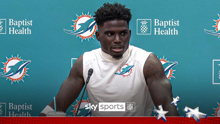 Miami Dolphins wide receiver Tyreek Hill speaks at a press conference