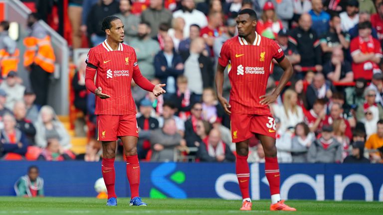 Liverpool's Virgil van Dijk and Ryan Gravenberch look on in disbelief after Nottingham Forest take a 1-0 lead