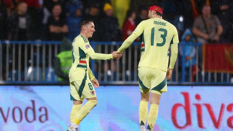 Kieffer Moore and Harry Wilson celebrate in Montenegro