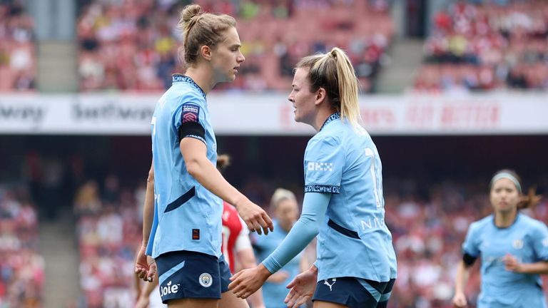 Vivianne Miedema is congratulated by Lauren Hemo after equalising for Man City at Arsenal