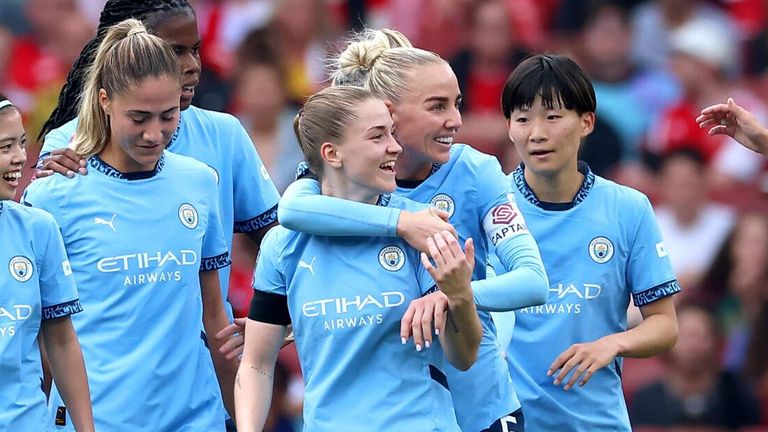 Jess Park is mobbed by her team-mates after giving Manchester City a 2-1 lead at Arsenal