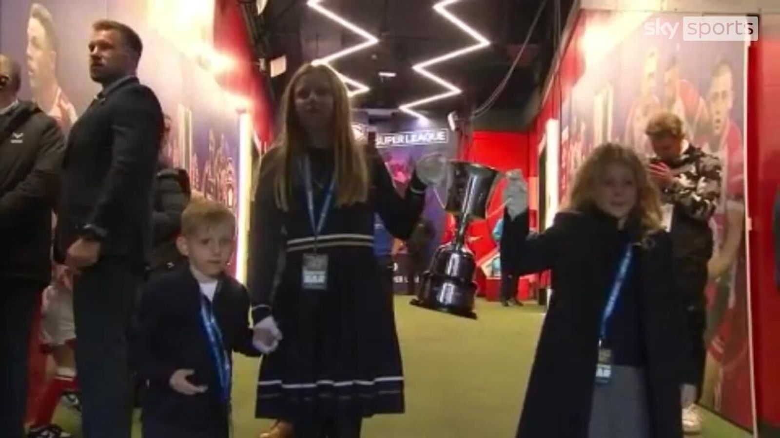 Rob Burrow's children and his wife carry out the newly named Player of