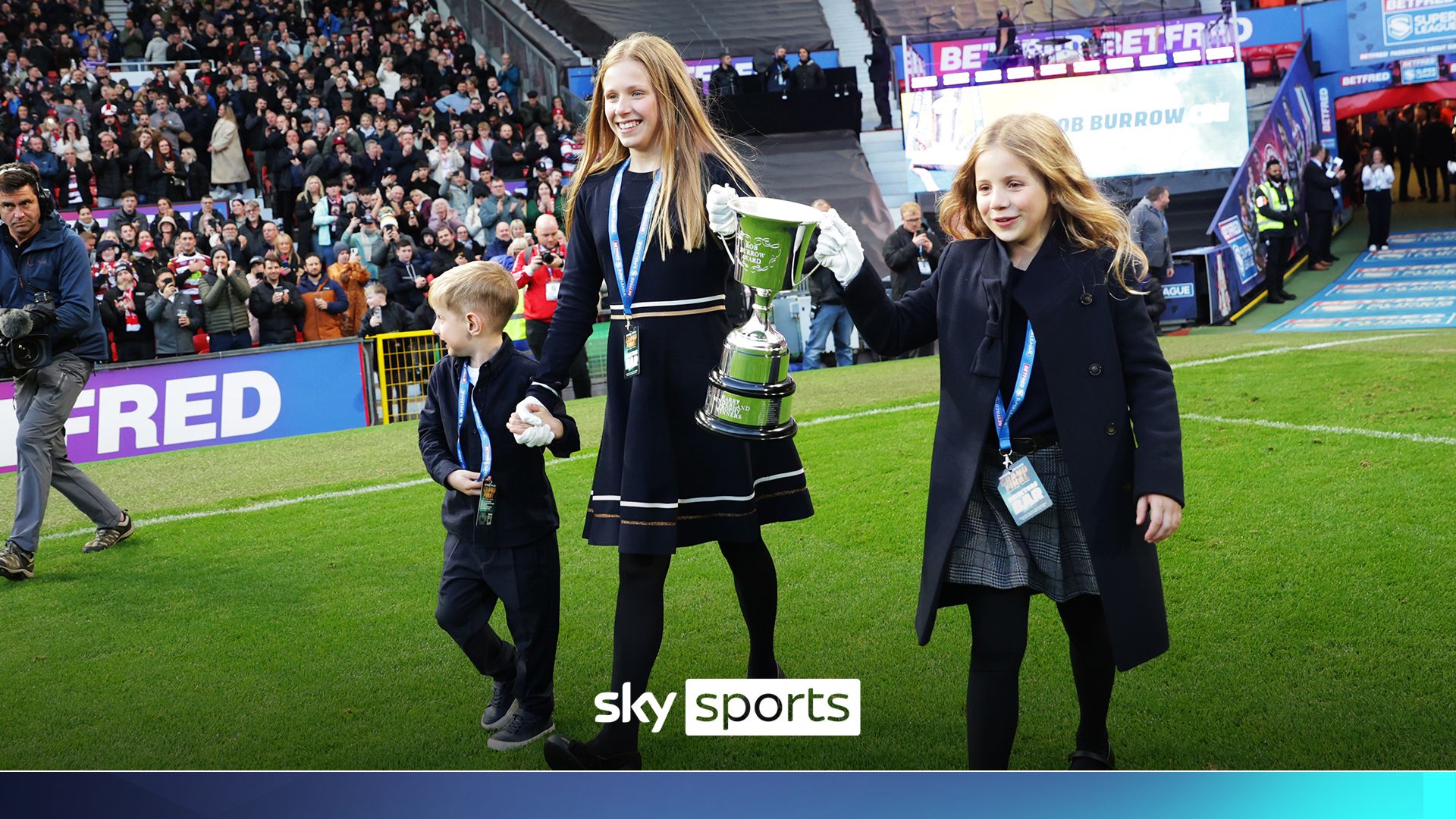 Rob Burrow's family carry out the newly named Player of the Match award