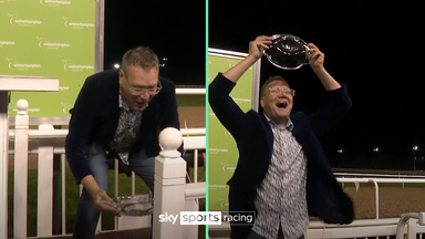 Look what it means! Racehorse owner's 'Champions League' trophy lift!