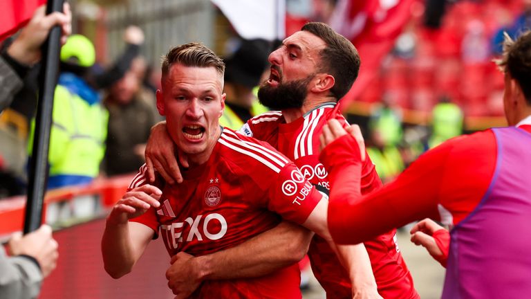 Aberdeen's Ante Palaversa celebrates scoring to make it 3-2 late on