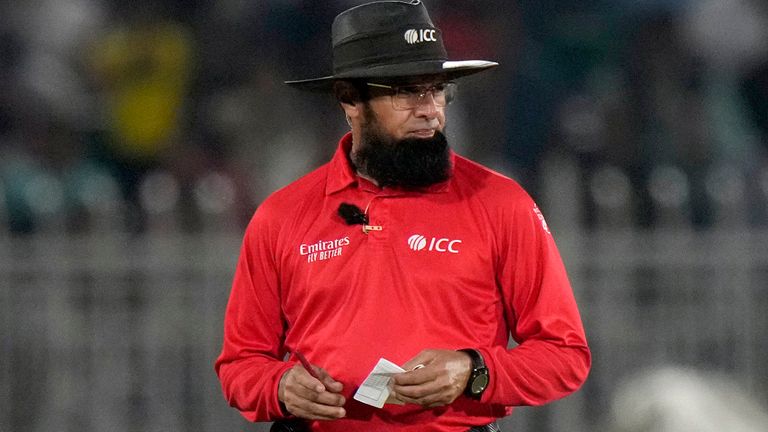 FILE - Pakistani umpire Aleem Dar walks toward his standing point during the second one-day international cricket match between Pakistan and New Zealand, in Rawalpindi, Pakistan, Saturday, April 29, 2023. (AP Photo/Anjum Naveed, File)