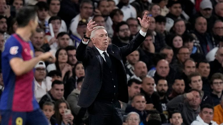 Real Madrid's head coach Carlo Ancelotti reacts during a Spanish La Liga soccer match between Real Madrid and Barcelona at the Santiago Bernabeu stadium in Madrid, Spain, Saturday, Oct. 26, 2024. (AP Photo/Bernat Armangue)