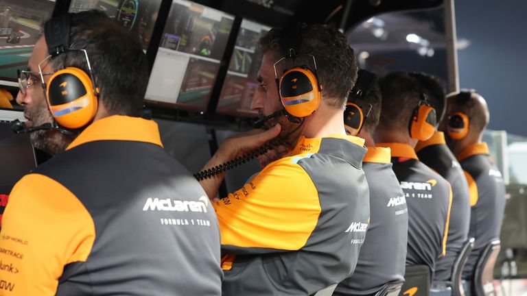 McLaren team principal Andrea Stella, centre, looks at the screen on a pit wall during qualifying session ahead of the Abu Dhabi Formula One Grand Prix at the Yas Marina Circuit, Abu Dhabi, UAE, Saturday, Nov. 25, 2023. (Ali Haider/Pool via AP)