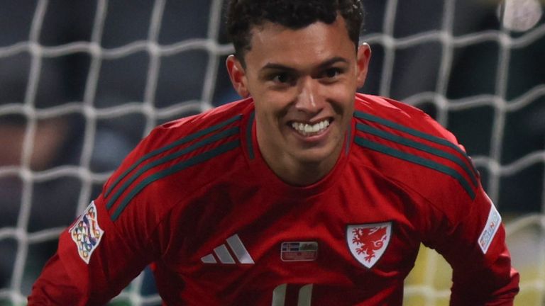 Wales' Brennan Johnson celebrates after scoring during the football match between Iceland and Wales in the UEFA Nations League Group 4 in Reykjavik, Iceland, Friday, October 11, 2024 .