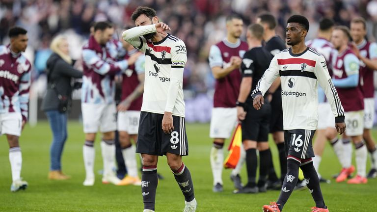 Manchester United's Bruno Fernandes and Amad Diallo react after the 2-1 defeat to West Ham