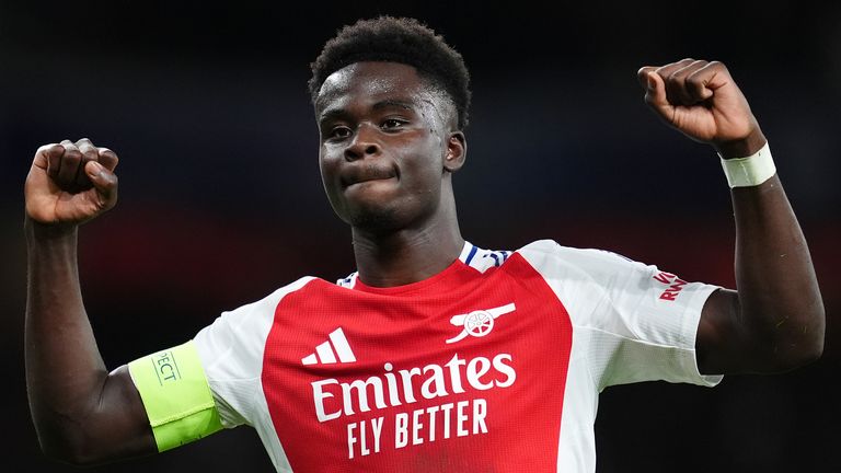 Arsenal's Bukayo Saka celebrates scoring the second goal against PSG