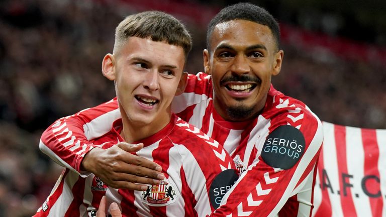 Chris Rigg (left) celebrates with Sunderland team-mate Wilson Isidor after scoring their early opener.