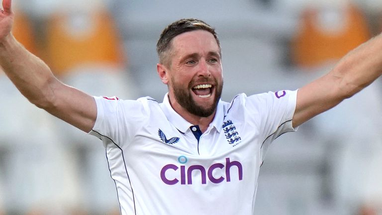 England's Chris Woakes, left, appeals successful LBW out of Pakistan's Babar Azam, right, during the first day of the first test cricket match between Pakistan and England, in Multan, Pakistan, Monday, Oct. 7, 2024. (AP Photo/Anjum Naveed)