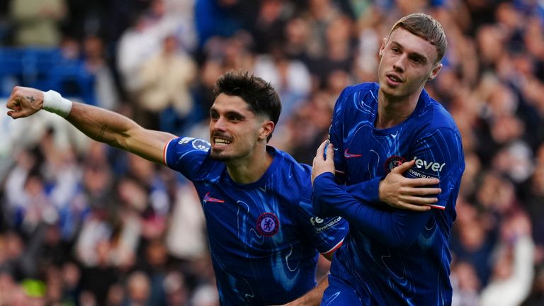 Chelsea's Cole Palmer celebrates with team-mate Pedro Neto after scoring his side's second goal (AP Photo/Dave Shopland)