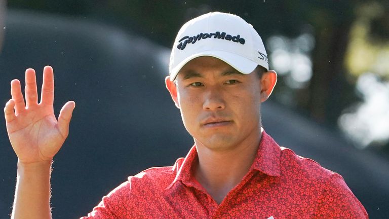 Collin Morikawa of the United States acknowledges members of the audience on the seventeenth hole in the final round of the PGA Tour Zozo Championship at the Narashino Country Club in Inzai on the outskirts of Tokyo, Sunday, Oct. 22, 2023. (AP Photo/Tomohiro Ohsumi)