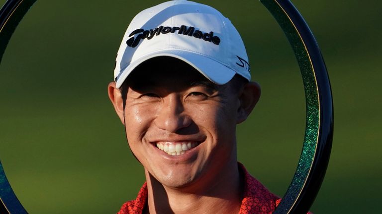 Collin Morikawa of the United States poses with the trophy after winning the PGA Tour Zozo Championship at the Narashino Country Club in Inzai on the outskirts of Tokyo, Sunday, Oct. 22, 2023. (AP Photo/Tomohiro Ohsumi)