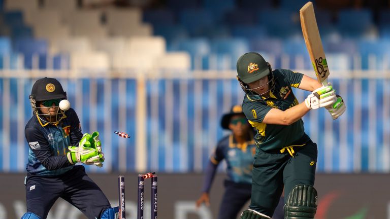 Australia's captain Alyssa Healy is bowled out by Sri Lanka's Udeshika Prabodhani during the ICC Women's T20 World Cup 2024 match between Australia and Sri Lanka at Sharjah Stadium, United Arab Emirates, Saturday, Oct. 5, 2024. (AP Photo/Altaf Qadri)