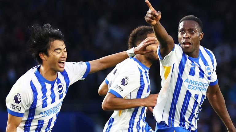 Danny Welbeck of Brighton & Hove Albion celebrates scoring his team's third goal with teammate Kaoru Mitoma during the Premier League match between Brighton & Hove Albion FC and Tottenham Hotspur FC at Amex Stadium