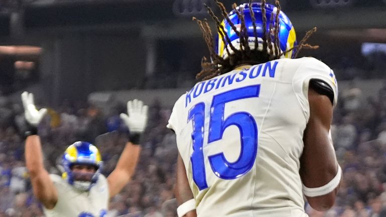 Los Angeles Rams wide receiver Demarcus Robinson (15) catches a touchdown pass during the second half of an NFL football game against the Minnesota Vikings, Thursday, Oct. 24, 2024, in Inglewood, Calif. (AP Photo/Mark J. Terrill) 