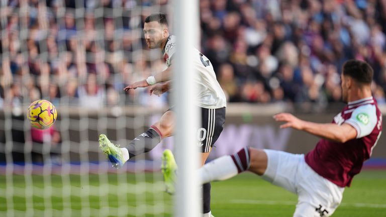 Diogo Dalot sends his effort over the bar