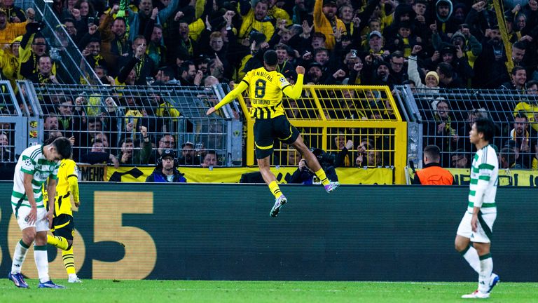 Borussia Dortmund's Felix Nmecha celebrates scoring to make it 7-1 