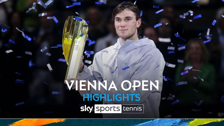 Britain's Jack Draper holds the trophy after defeating Karen Khachanov in the final of the Erste Bank Open ATP tennis tournament in Vienna, Austria, Sunday, October 27, 2024. (AP Photo/Heinz-Peter Bader)