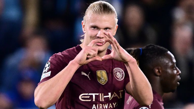 Erling Haaland celebrates scoring his 42nd Champions League goal and Man City's third. 