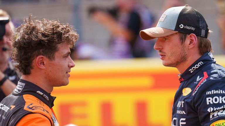 McLaren driver Lando Norris, of Britain, left, talks with Red Bull driver Max Verstappen, of the Netherlands, right, after the sprint race ahead of the Formula One U.S. Grand Prix auto race at Circuit of the Americas, Saturday, Oct. 19, 2024, in Austin, Texas. (AP Photo/Nick DIdlick)