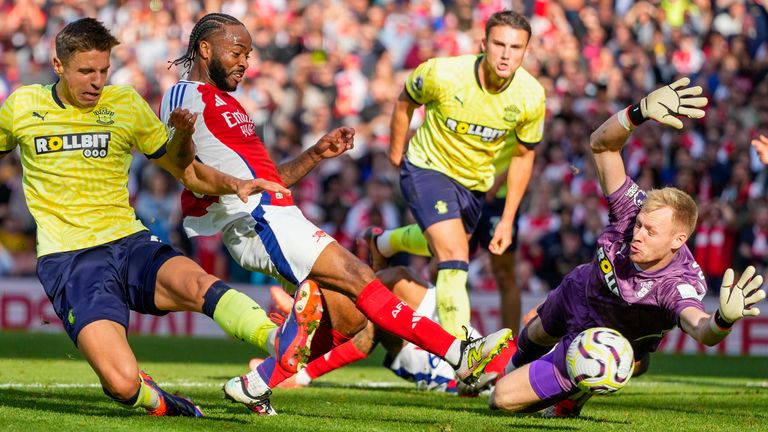 Southampton goalkeeper Aaron Ramzdale stops