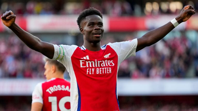 Arsenal's Bukayo Saka celebrates after scoring his side's third goal against Southampton