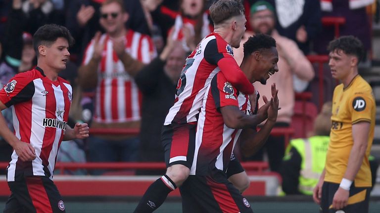 Brentford's Ethan Pinnock celebrates scoring their side's fourth goal against Wolves