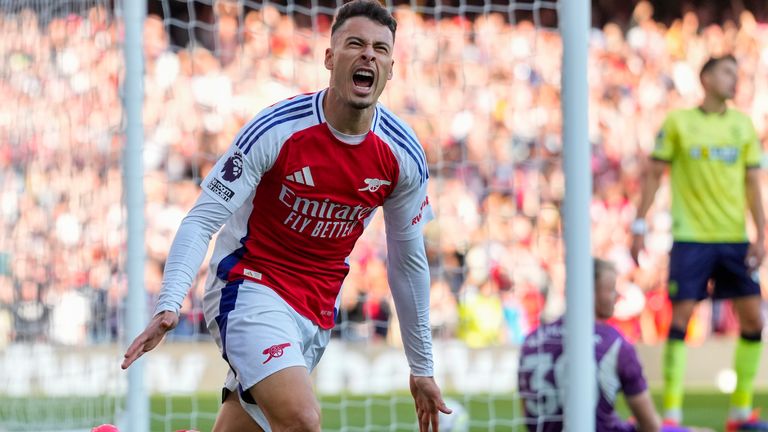 Arsenal's Gabriel Martinelli celebrates after scoring his team's second goal during the English Premier League soccer match between Arsenal and Southampton at the Emirates Stadium in London on Saturday, October 5, 2024. (AP Photo/Kirsty Wigglesworth)