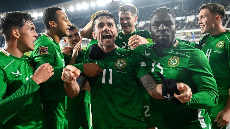 Robbie Brady of Republic of Ireland, centre, celebrates with team-mates after scoring their side's winning goal against Finland