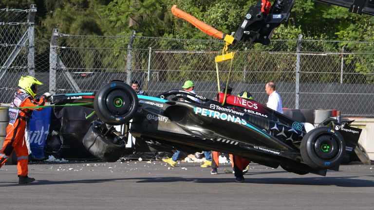 AUTODROMO HERMANOS RODRIGUEZ, MEXICO - OCTOBER 25: Marshals remove the damaged car of George Russell, Mercedes F1 W15, from the circuit after a crash in FP2 during the Mexican GP at Autodromo Hermanos Rodriguez on Friday October 25, 2024 in Mexico City, Mexico. (Photo by Mark Sutton / Sutton Images)