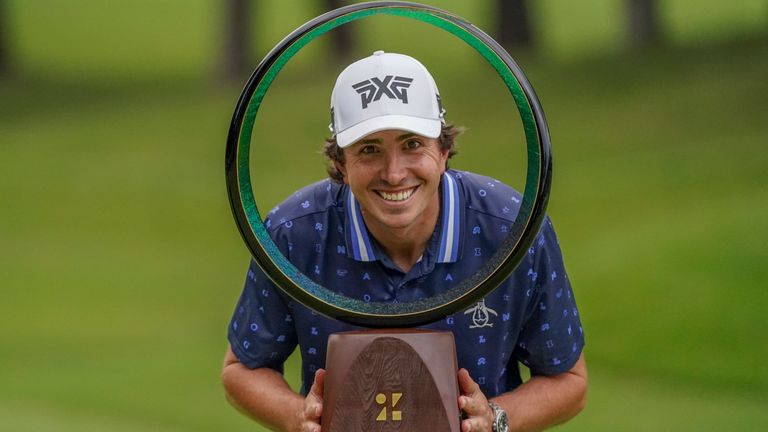 Nico Echavarria poses with the trophy after winning the PGA Tour Zozo Championship at the Narashino Country Club in Inzai