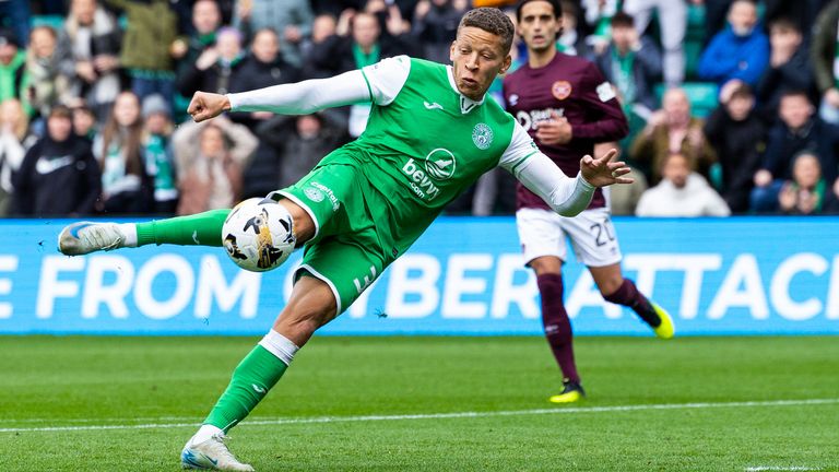 EDINBURGH, SCOTLAND - OCTOBER 27: Hibernian's Dwight Gayle has a shot at goal during a William Hill Premiership match between Hibernian and Heart of Midlothian at Easter Road, on October 27, 2024, in Edinburgh, Scotland. (Photo by Ross Parker / SNS Group)