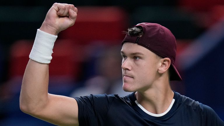 Holger Rune of Denmark reacts during the men's singles second round match against Matteo Berrettini of Italy in the Shanghai Masters tennis tournament at Qizhong Forest Sports City Tennis Center in Shanghai, China, Monday, Oct. 7, 2024. (AP Photo/Andy Wong)