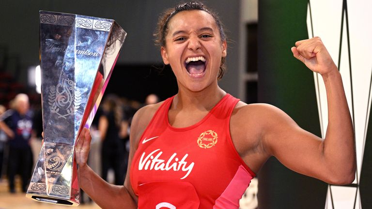 Imogen Allison celebrates with the Taini Jamison Trophy.