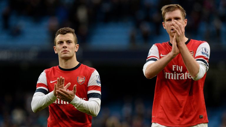 Jack Wilshire (left) and Per Mertesacker (right) during their time at Arsenal together. 