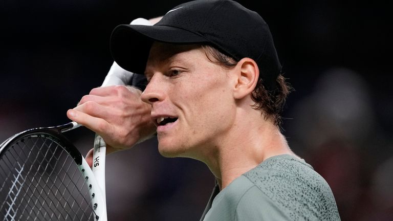 Jannik Sinner of Italy reacts during the men's singles finals match against Novak Djokovic of Serbia in the Shanghai Masters tennis tournament at Qizhong Forest Sports City Tennis Center in Shanghai, China, Sunday, Oct. 13, 2024. (AP Photo/Andy Wong)