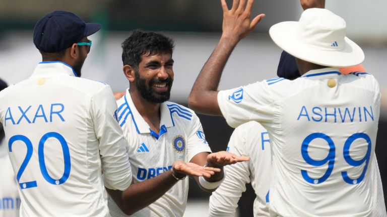 India's Jasprit Bumrah, center, celebrates with teammate the wicket of Bangladesh's Mehidy Hasan Miraz on the fifth and final day of the second cricket test match between Bangladesh and India in Kanpur, India, Tuesday, October 1, 2024. (AP Photo/Ajit Solanki)