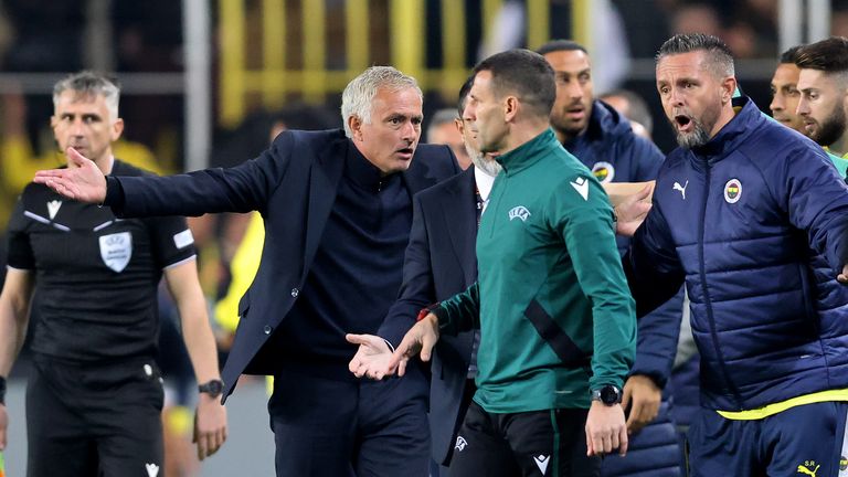 Jose Mourinho protests to the fourth official before his red card during Fenerbahce's Europa League match against Manchester United