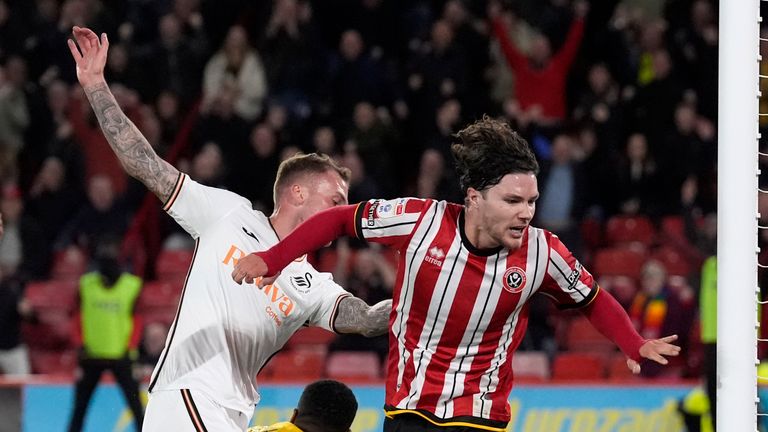 Swansea City's Josh Tymon scores an own goal and Sheffield United's first goal of the game during the Sky Bet Championship match at Bramall Lane, Sheffield. Picture date: Wednesday October 2, 2024. PA Photo. See PA story SOCCER Sheff Utd. Photo credit should read: Danny Lawson/PA Wire...RESTRICTIONS: EDITORIAL USE ONLY No use with unauthorised audio, video, data, fixture lists, club/league logos or "live" services. Online in-match use limited to 120 images, no video emulation. No use in betting, games or single club/league/player publications.