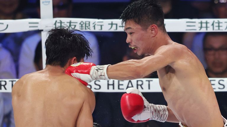 Japan's Junto Nakatani hits a punch on Thailand's Petch Sor Chitpattana during the sixth round of the World Boxing Council (WBC) bantamweight title match at the Ariake Arena in Tokyo, Japan, on October 14, 2024. Nakatani retains his champion belt by TKO in the sixth round. ( The Yomiuri Shimbun via AP Images )