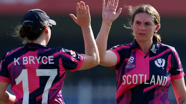 Saskia Horley celebrates taking a wicket with Scotland team-mate Kathryn Bryce against Bangladesh