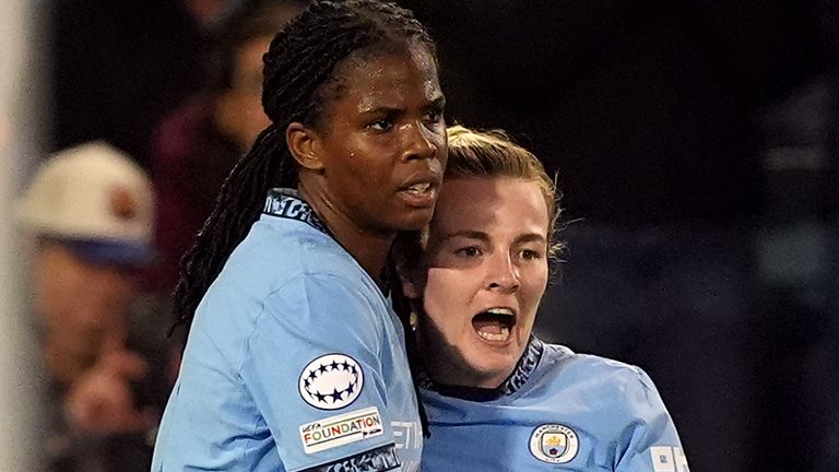 Manchester City's Khadija Shaw celebrates scoring their side's second goal of the game with team-mate Lauren Hemp (right) during the UEFA Women's Champions League Group D match at the Manchester City Joie Stadium. Picture date: Wednesday October 9, 2024.