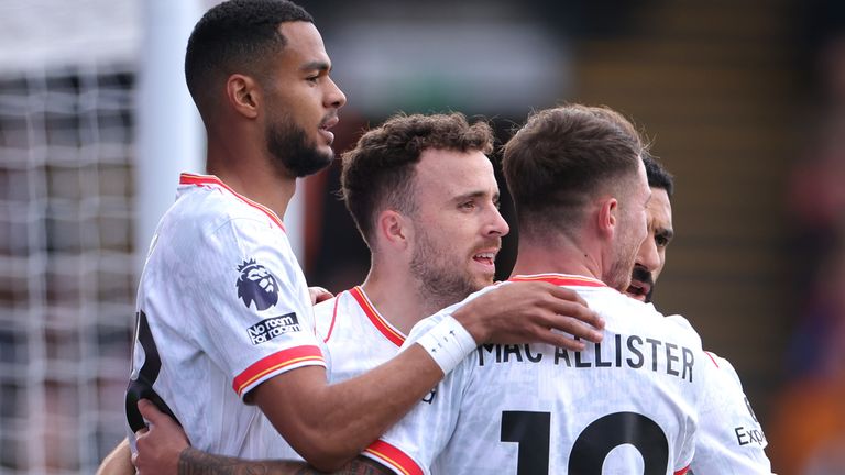 LONDON, ENGLAND - OCTOBER 05: Diogo Jota of Liverpool celebrates scoring his team's first goal with teammates during the Premier League match between Crystal Palace FC and Liverpool FC at Selhurst Park on October 05, 2024 in London, England. (Photo by Alex Pantling/Getty Images)